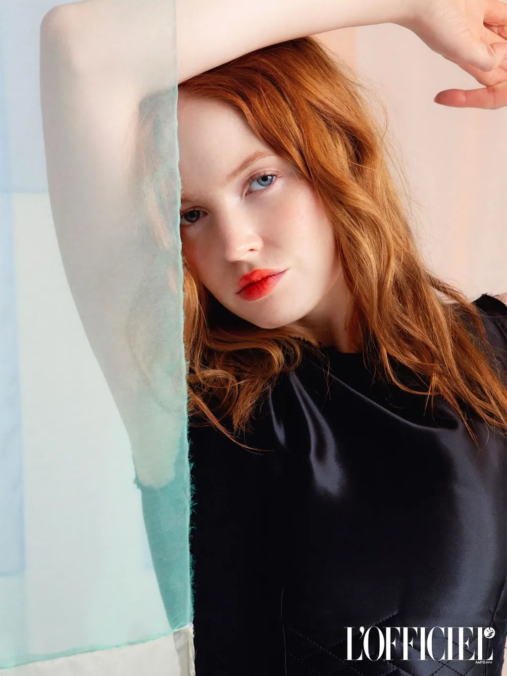 Ellie Bamber for L'Officiel USA with hair by Shennia Thompson